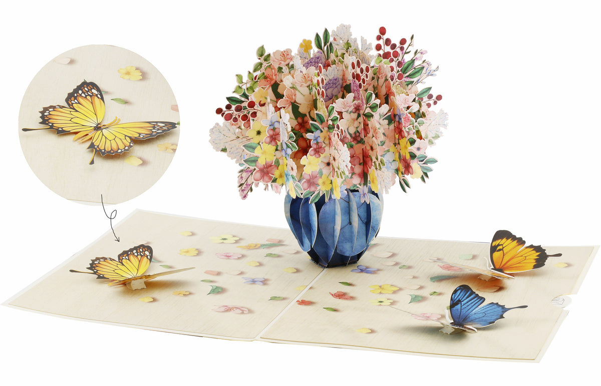 klappkarte mit buntem blumenstrauß in der vase, mit blauen und gelben schmetterlingen