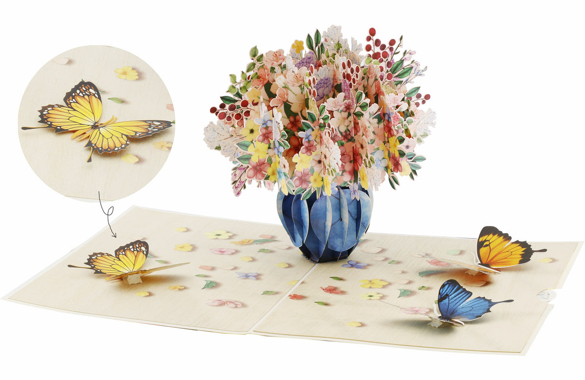 klappkarte mit buntem blumenstrauß in der vase, mit blauen und gelben schmetterlingen