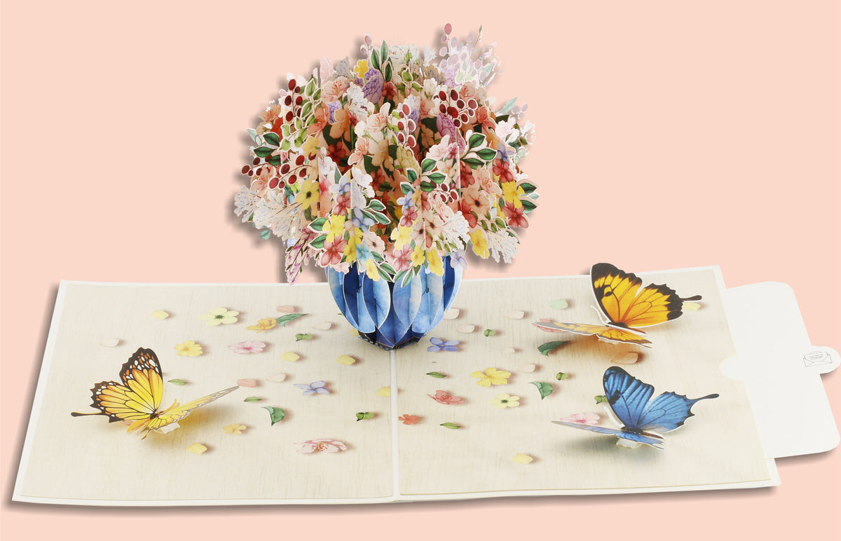 3d karte mit buntem blumenstrauß in der vase, mit blauen und gelben schmetterlingen