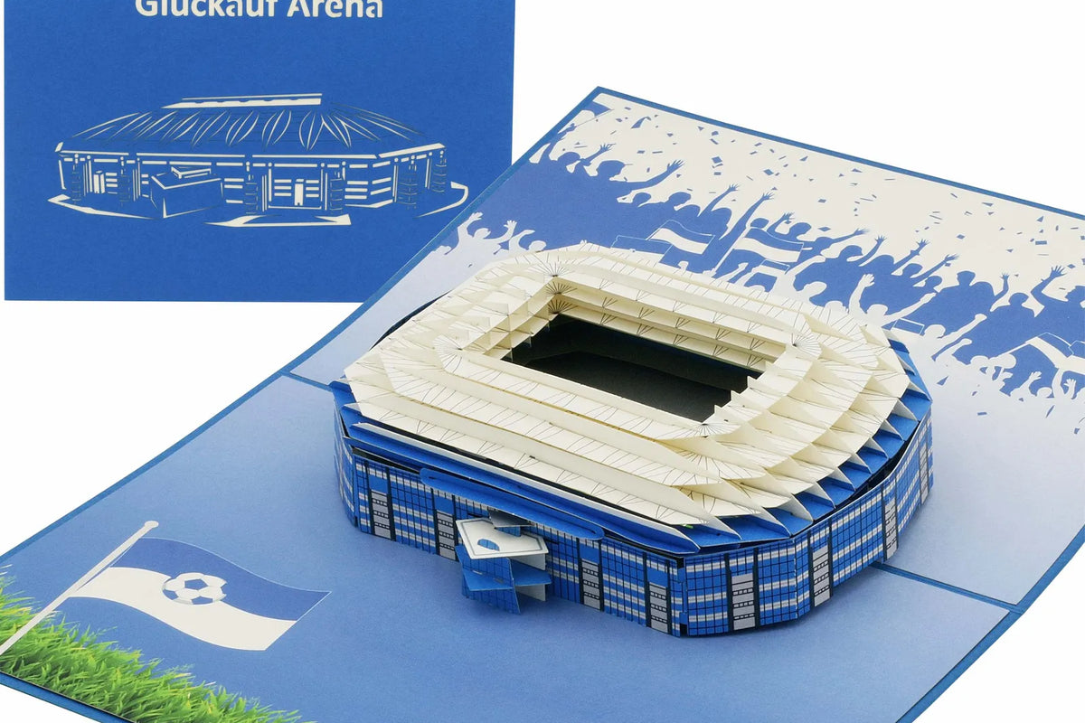 Pop-up Karte mit einem Stadionmodell und blauer Klappkarte mit dem Schriftzug Glück auf Arena, ideal für Fußballfans und als Geschenk aus Gelsenkirchen.