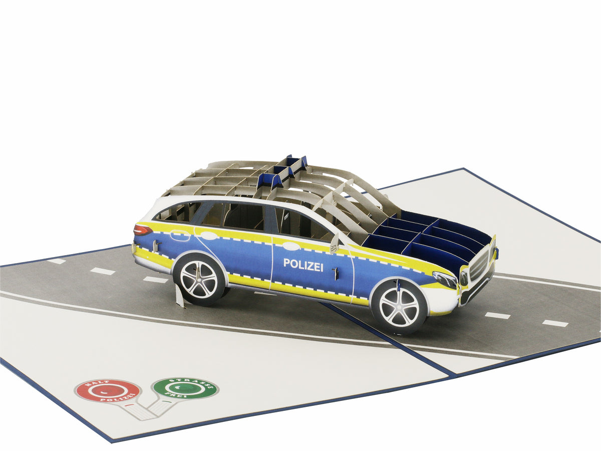 Klappkarte mit einem polizeiauto auf einer straße