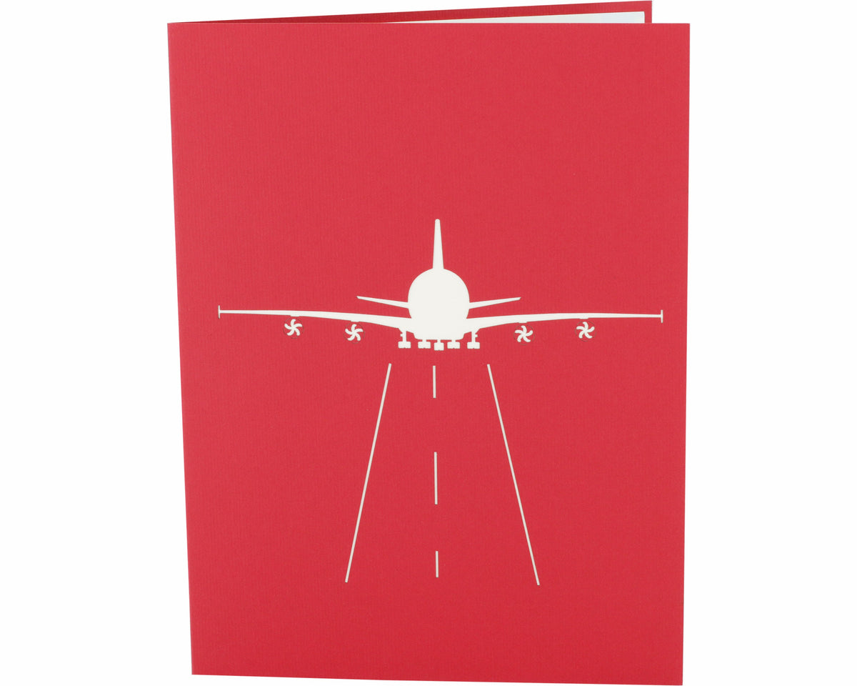 rote karte mit weißem flugzeug auf der Startbahn