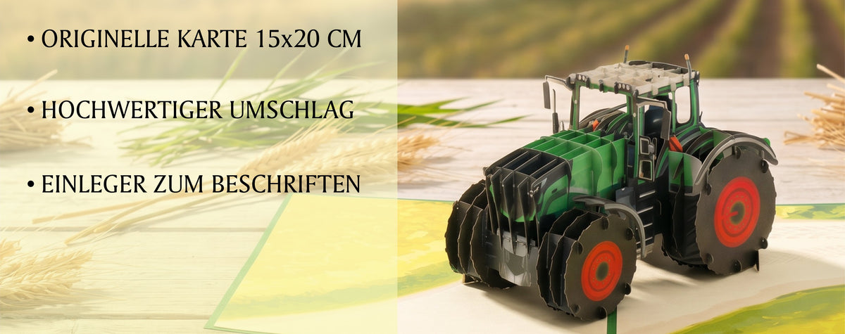 Aufgeklappte Pop-up-Karte mit detailreichem Traktor Modell aus Papier. Im Hintergrund ist ein Acker in der Natur abgebildet.