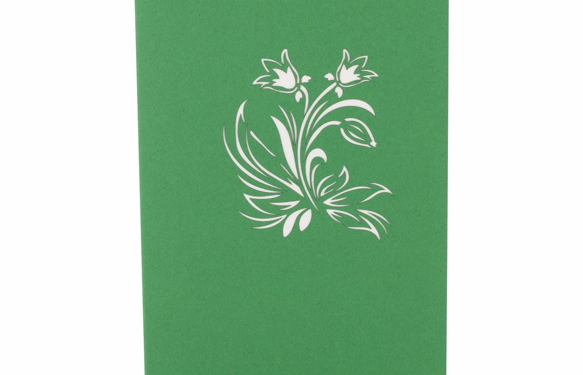 grüne pop up karte mit einem tulpenstrauß