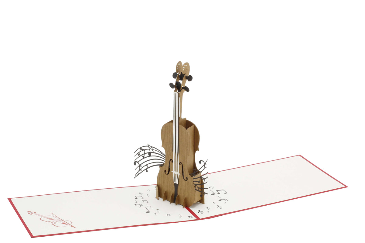 Aufgeklappte Pop-up-Karte mit Cello und schwebenden Noten, schräg von der Seite fotografiert.
