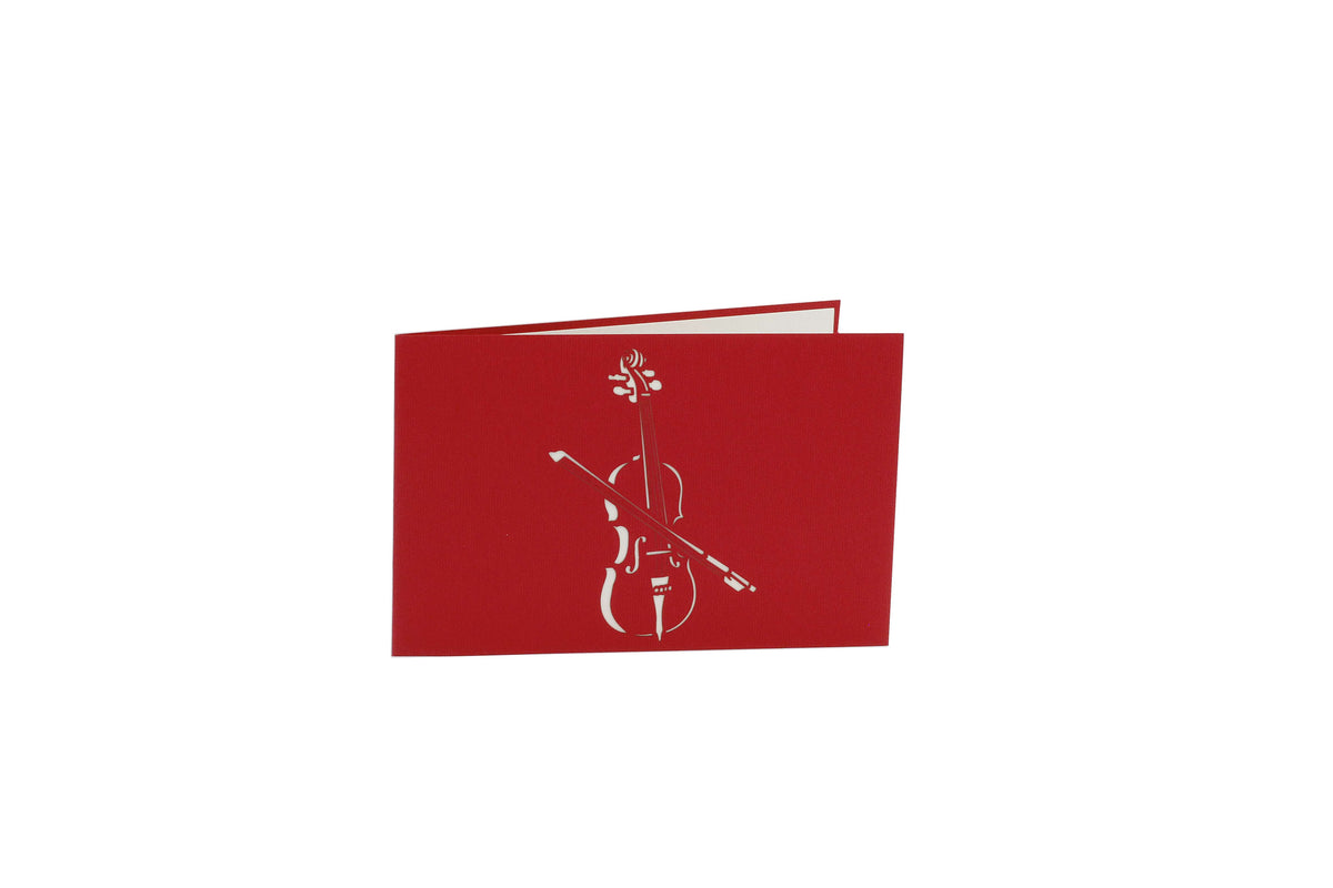 Rote Kartenvorderseite mit einem Cello und Noten als Scherenschnitt.