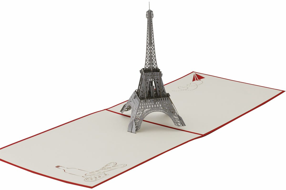 Aufgeklappte Pop-up-Karte mit dem Eiffelturm, seitlich fotografiert.