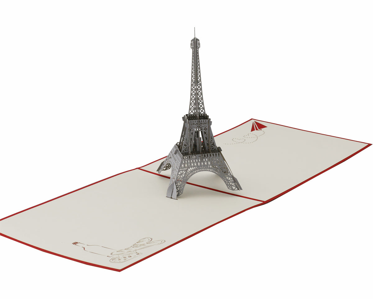 Aufgeklappte Pop-up-Karte mit dem Eiffelturm, seitlich fotografiert.