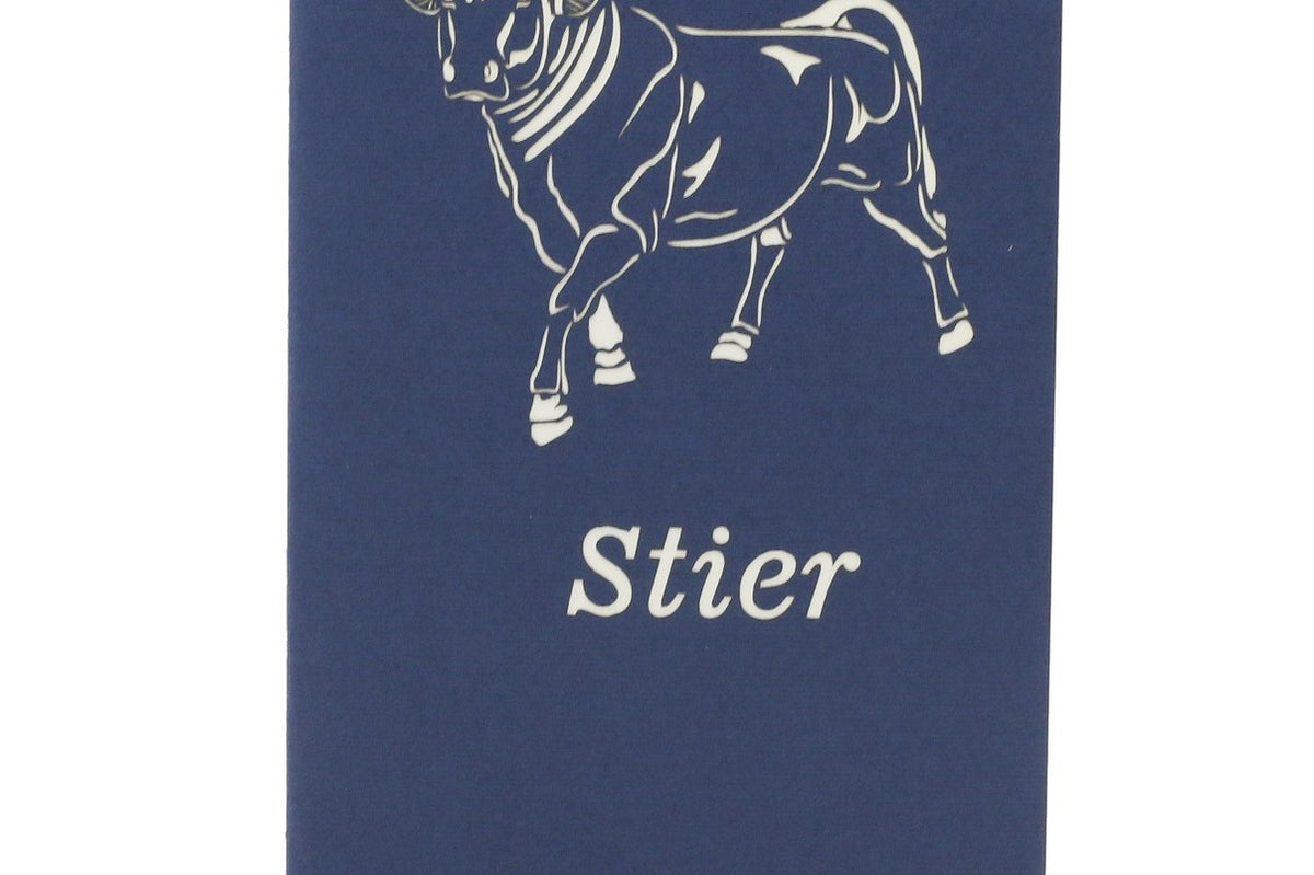 Dunkelblaue Kartenvorderseite mit einem Stier als Scherenschnitt und dem Schriftzug Stier.