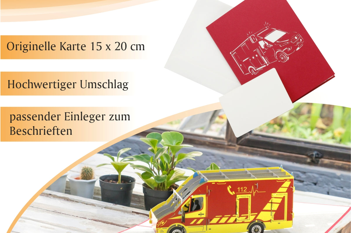 klappkarte mit krankenwagen auf dem tisch