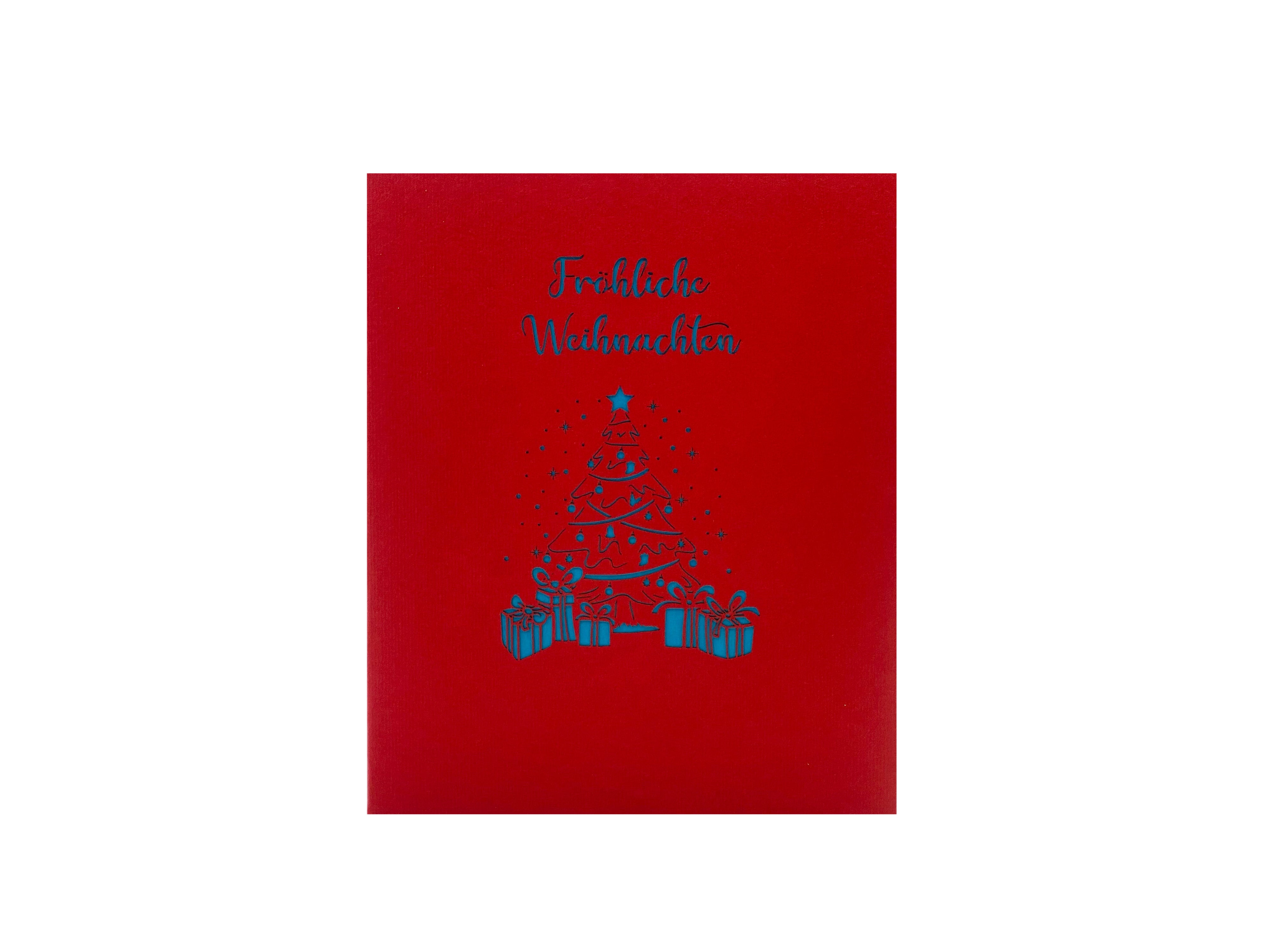 Rote Kartenvorderseite mit dem Schriftzug Fröhliche Weihnachten und einem blauen Weihnachtsbaum aus gestapelten Geschenken.