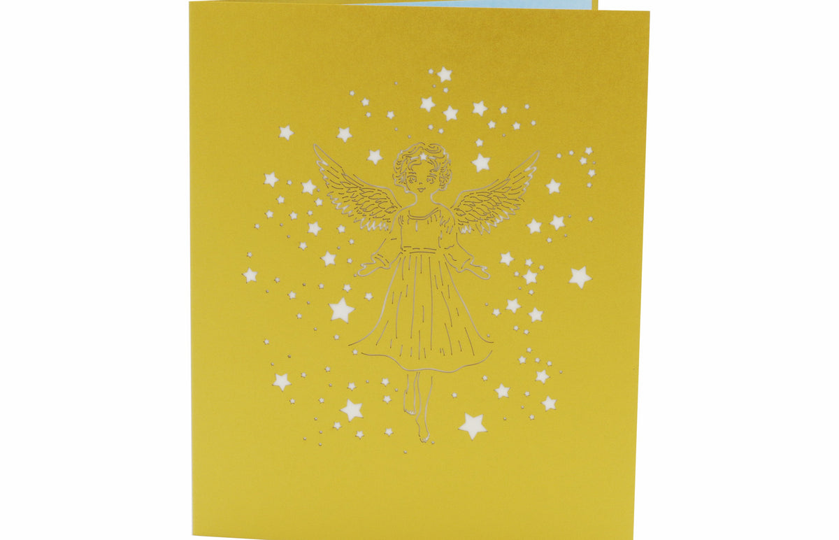 Goldene Klappkarte mit einem Scherenschnitt mit einem Engel und Sternen.