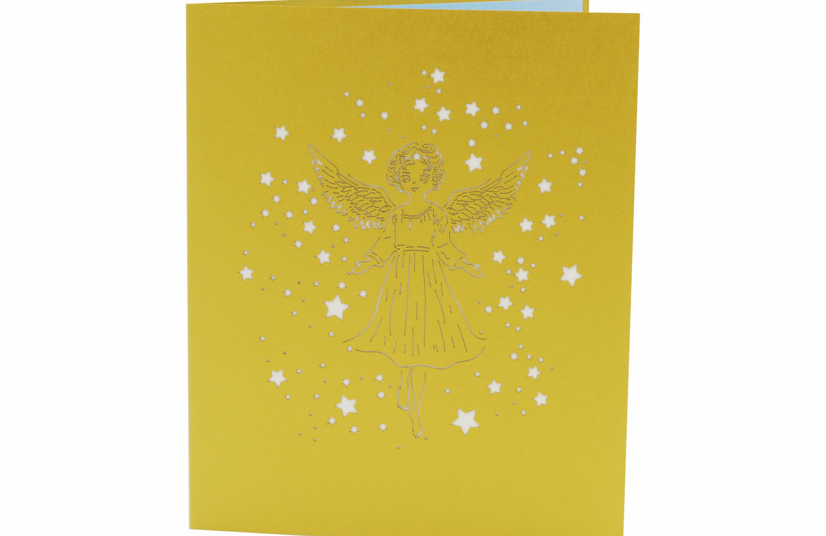 Goldene Klappkarte mit einem Scherenschnitt mit einem Engel und Sternen.