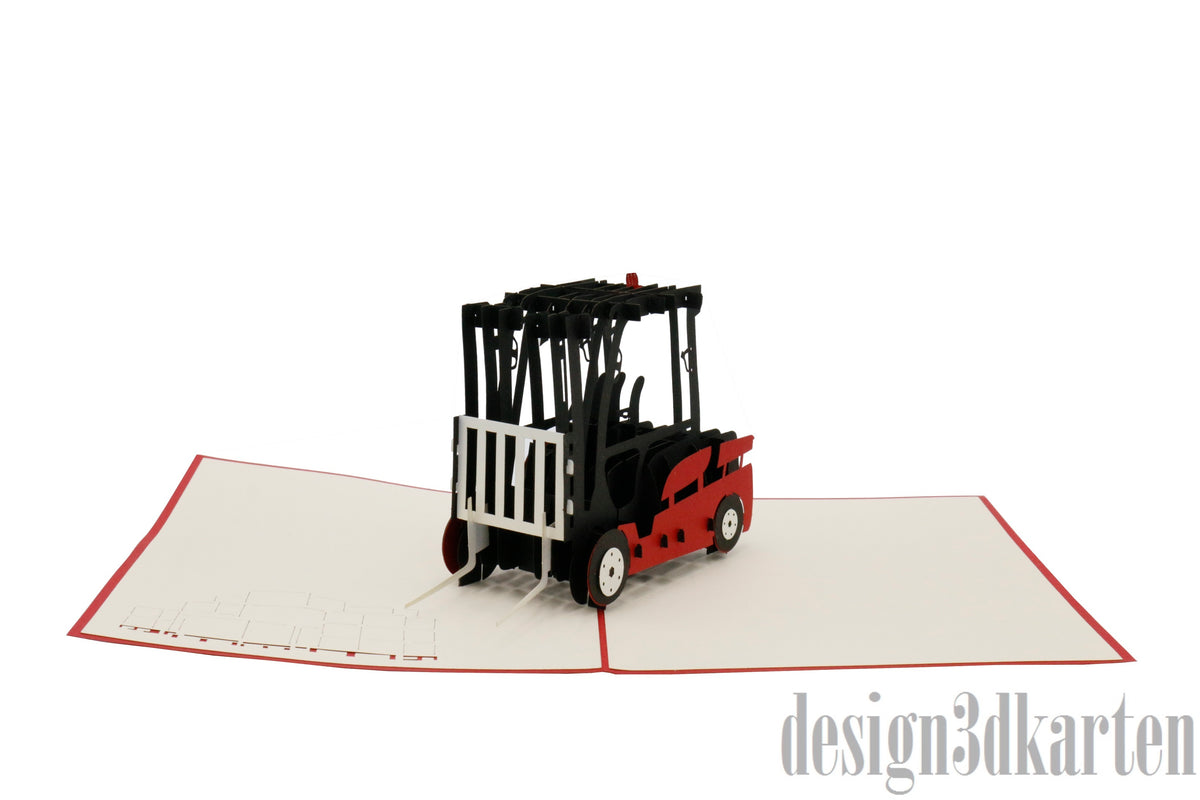 Aufgeklappte Pop-up-Karte mit rotem Gabelstapler, schräg von der Seite fotografiert.