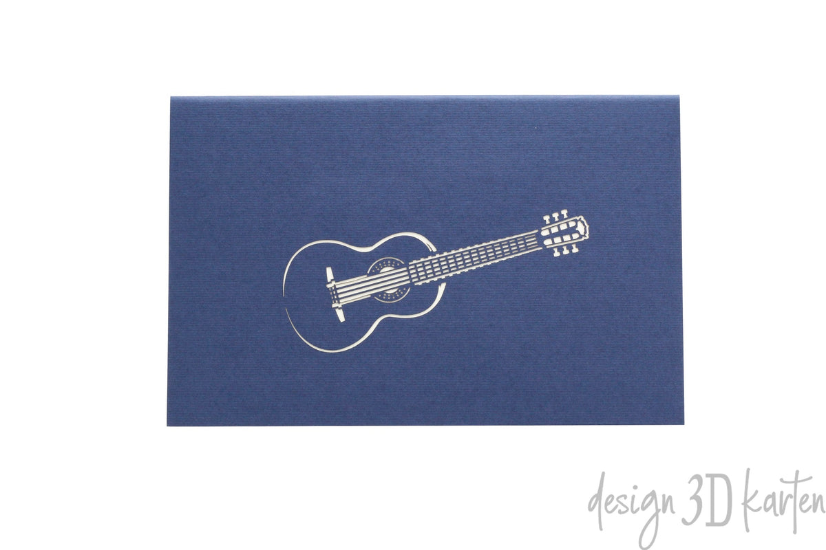 Dunkelblaue Kartenvorderseite mit einer Gitarre als Scherenschnitt.
