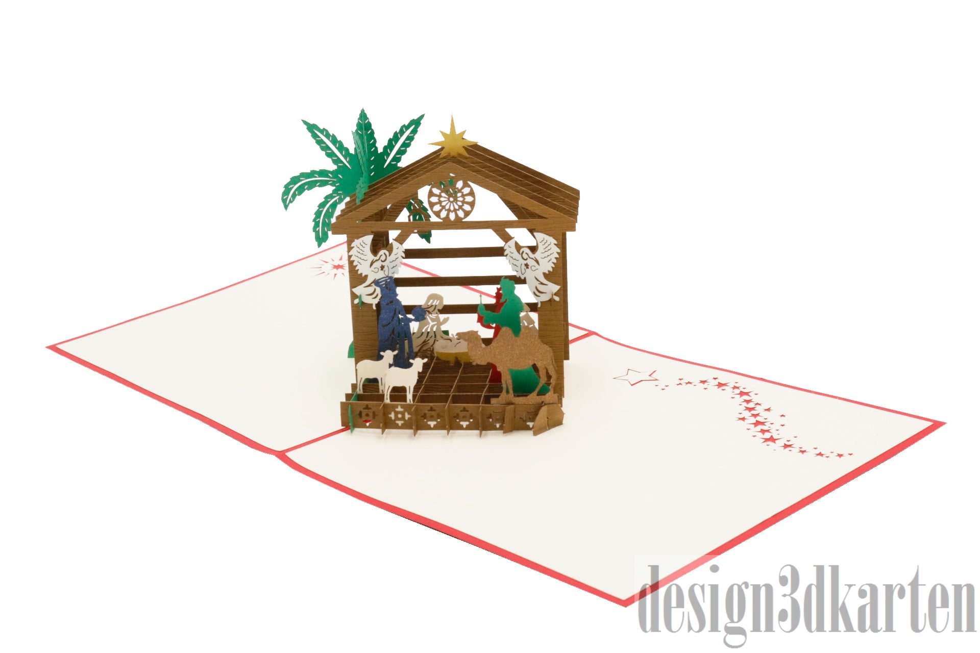 Aufgeklappte Pop-up-Karte mit rotem Rand und einer Weihnachtskrippe mit Stall, Palme und Figuren.