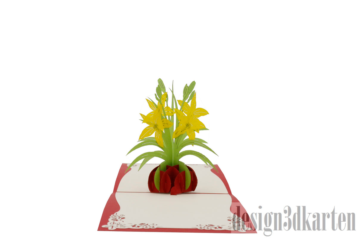 Aufgeklappte Pop-up-Karte mit rotem Rand und einem Strauß gelber Lilien in einer roten Vase.
