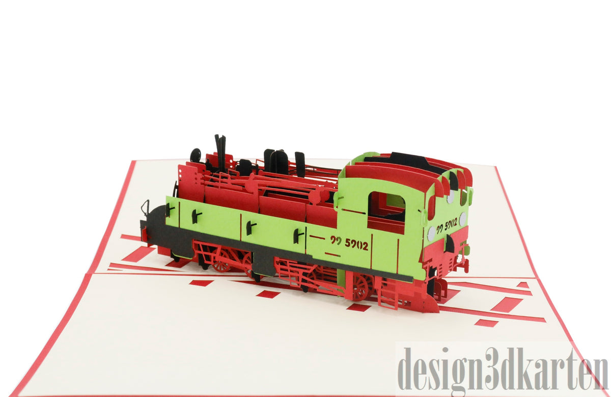 Aufgeklappte Pop-up-Karte mit detailreicher Dampflok in Rot und Grün auf angedeuteten Gleisen.