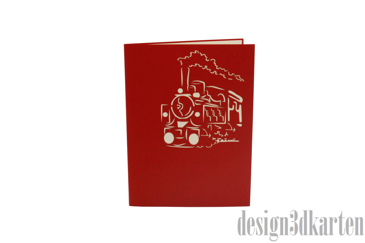 Rote Kartenvorderseite mit einer Dampflokomotive und Rauchwolke als Scherenschnitt.