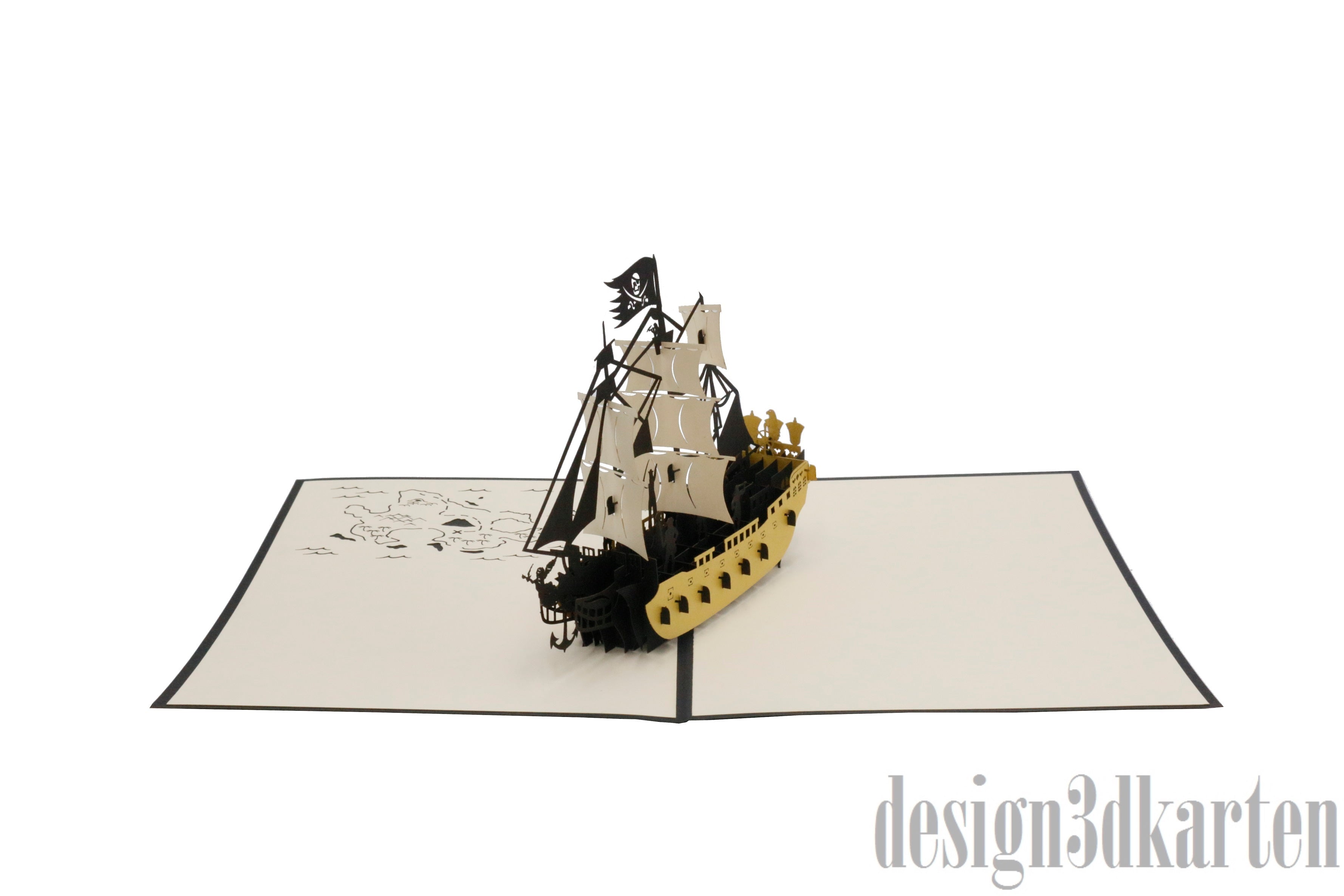Aufgeklappte Pop-up-Karte mit einem Piratenschiff aus Papier, frontal fotografiert.