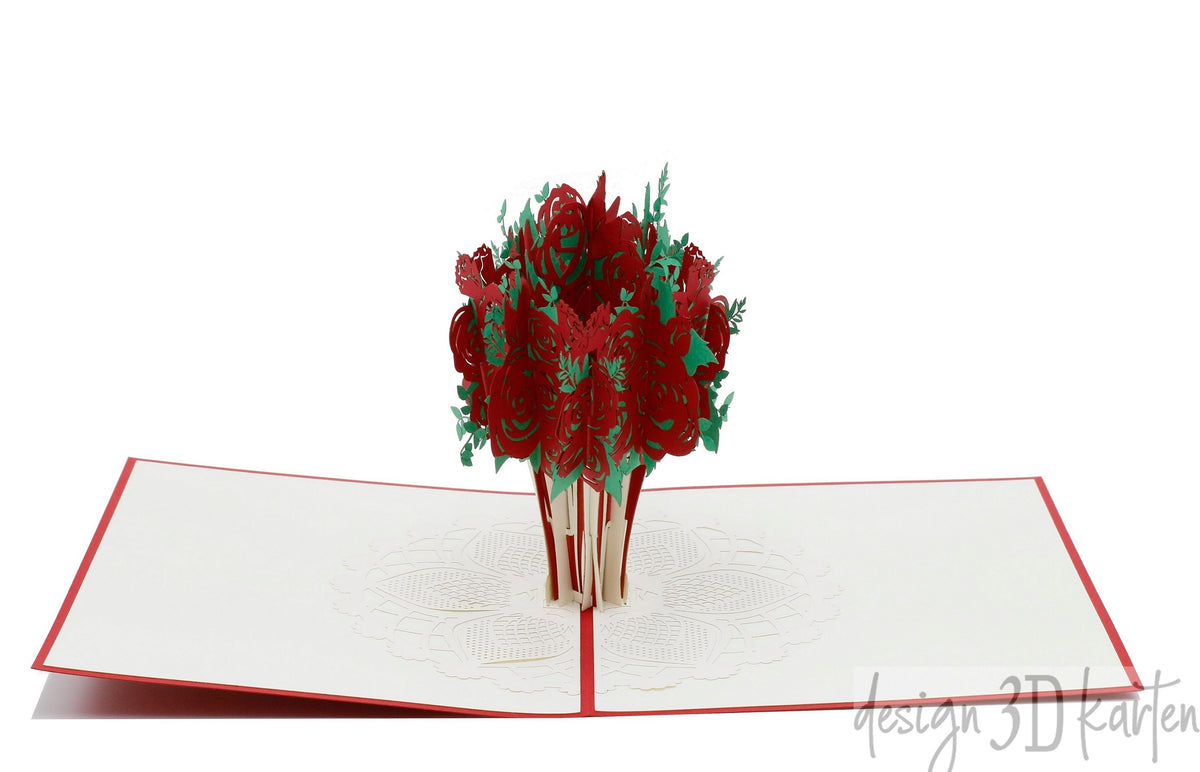 Aufgeklappte Pop-up-Karte mit rotem Rosenstrauß aus Papier, schräg von der Seite fotografiert.