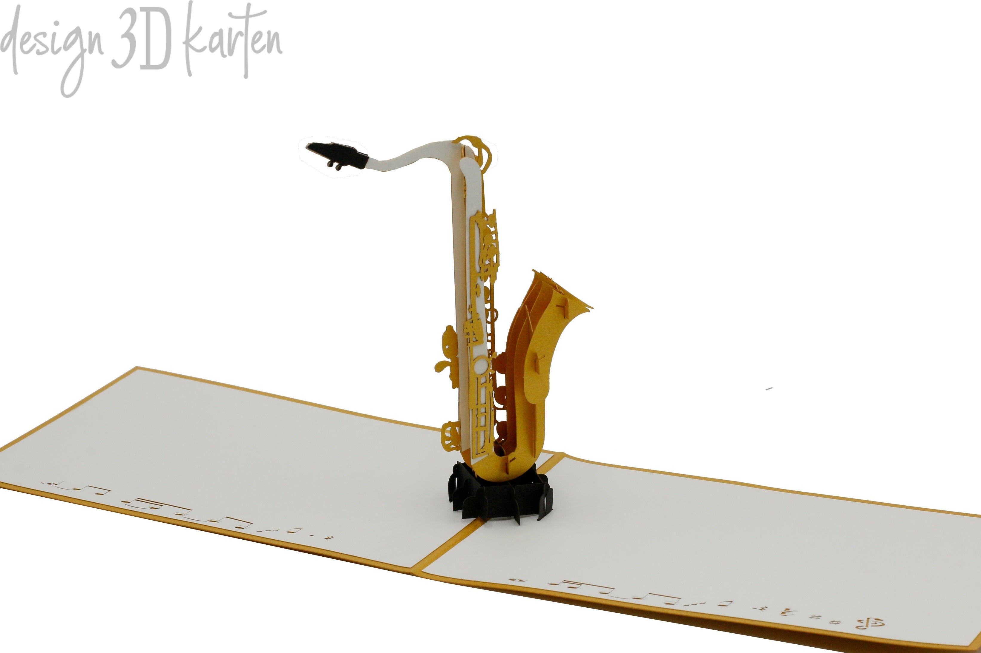 Aufgeklappte Pop-up-Karte mit Saxofon, schräg von der Seite fotografiert.
