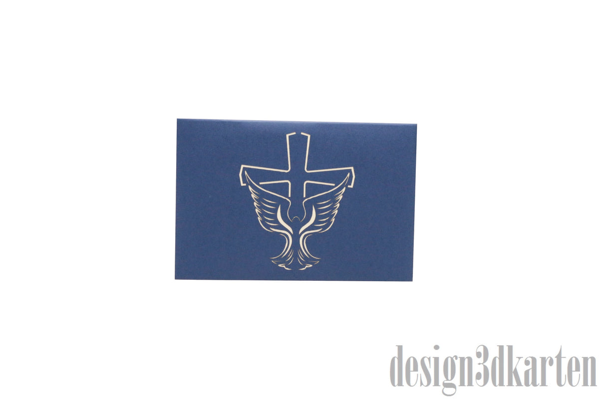 Dunkelblaue Kartenvorderseite mit Taufbecken, Kreuz und Taube als Scherenschnitt.