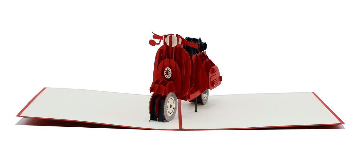Aufgeklappte Pop-up-Karte mit roter Vespa, frontal von vorne fotografiert.