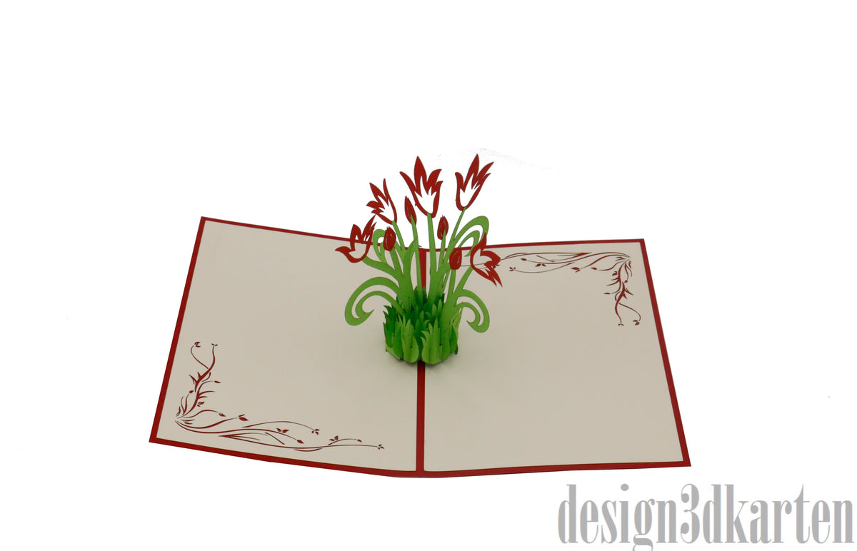 Aufgeklappte Pop-up-Karte mit rotem Rand und einem Strauß roter Tulpen mit grünen Blättern.