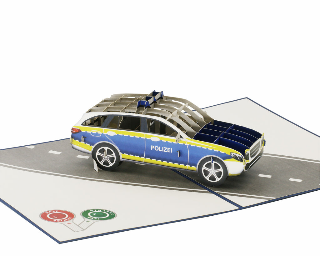 Klappkarte mit einem polizeiauto auf einer straße