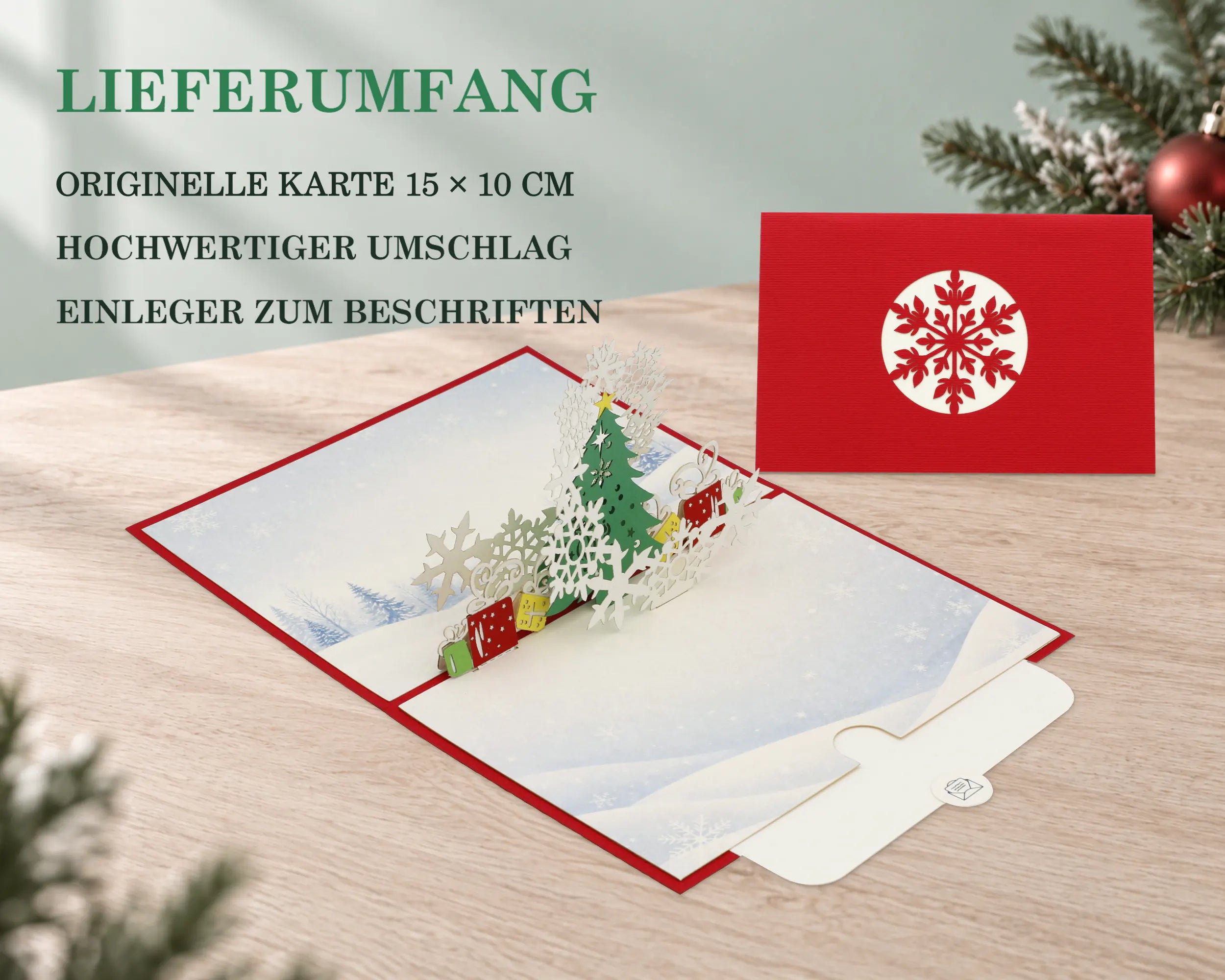 Weihnachtsbaum Pop-up Karte und rote Vorderseite mit Schneeflocken-Scherenschnitt auf Holztisch mit Tannenzweigen – Lieferumfang: originelle Karte 15 x 10 cm, hochwertiger Umschlag, Einleger zum Beschriften