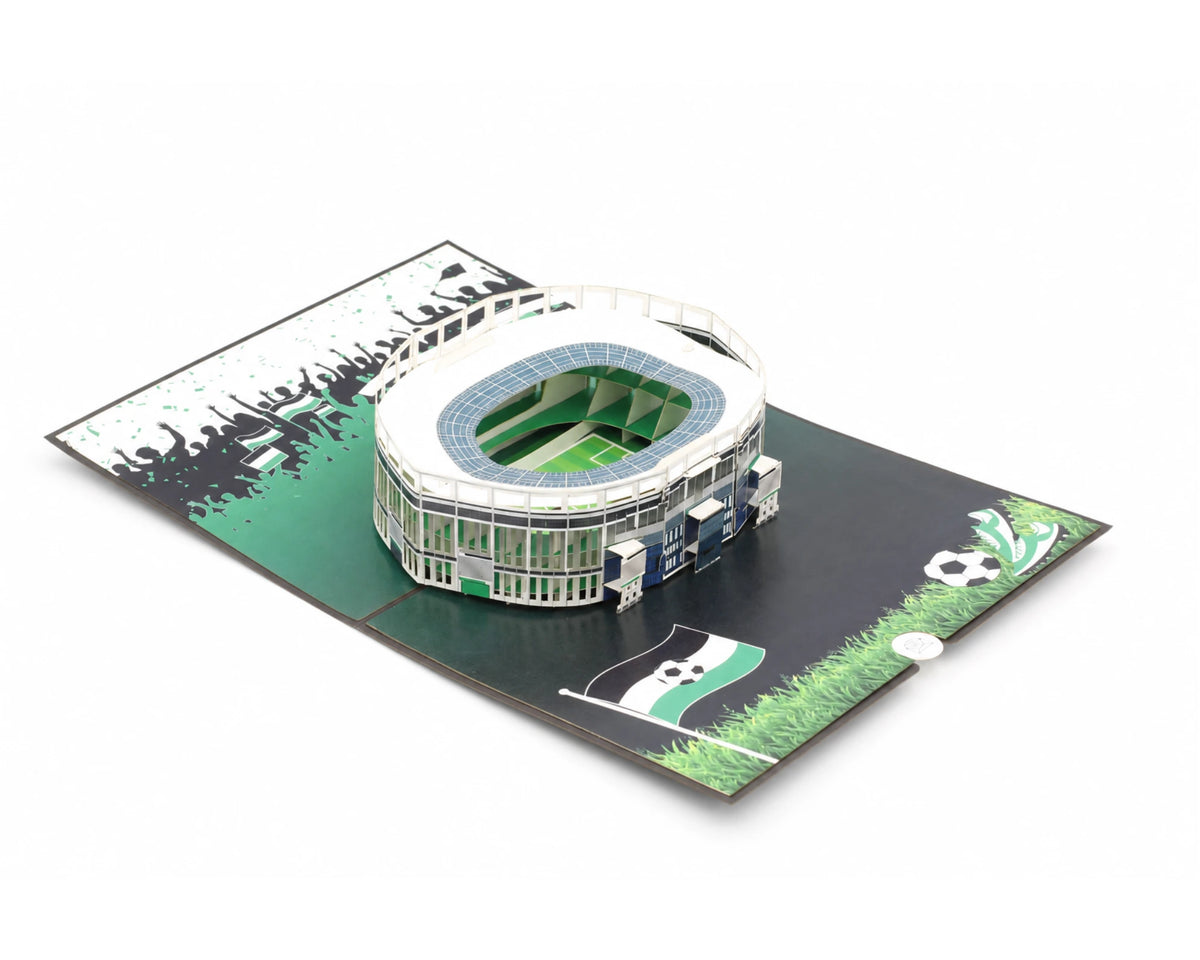 Pop-up-Karte Hannover schräg von oben: dreidimensionales Papierstadion mit Tribünen und Fansilhouetten auf der Karte