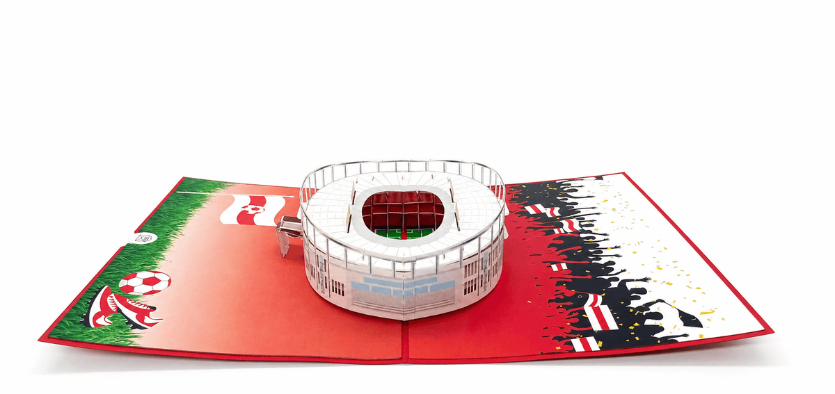 Aufgeklappte Pop-up-Karte mit dem Stuttgarter Stadion, von schräg oben fotografiert.