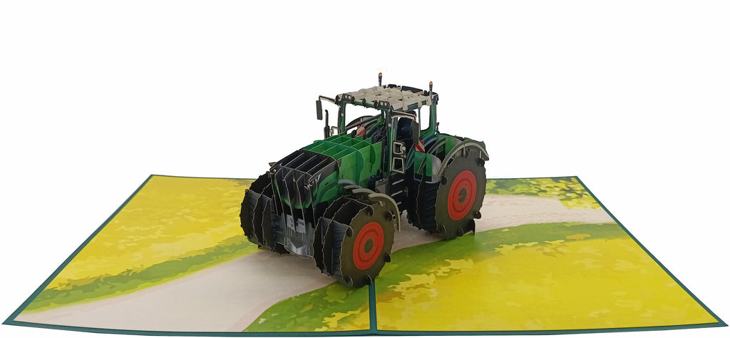 pop up karte grüner traktor mit roten felgen auf dem acker