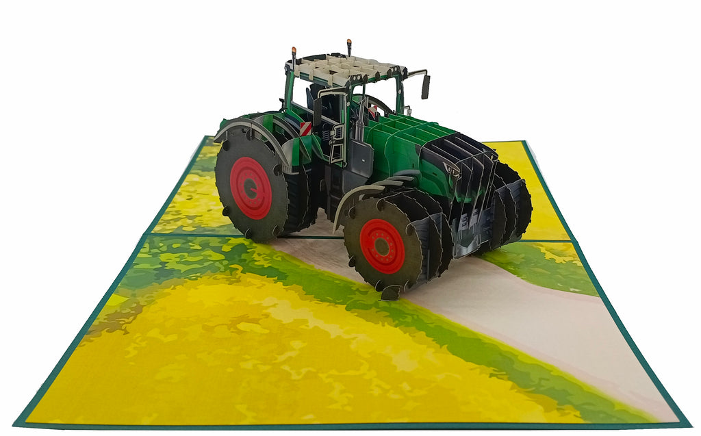 pop up karte grüner traktor mit roten felgen auf dem acker