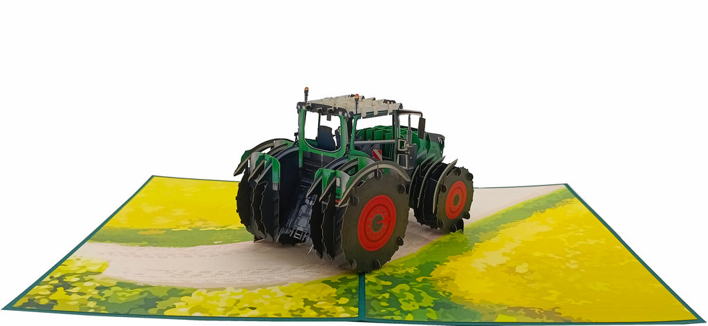 klappkarte grüner traktor mit roten felgen auf dem acker
