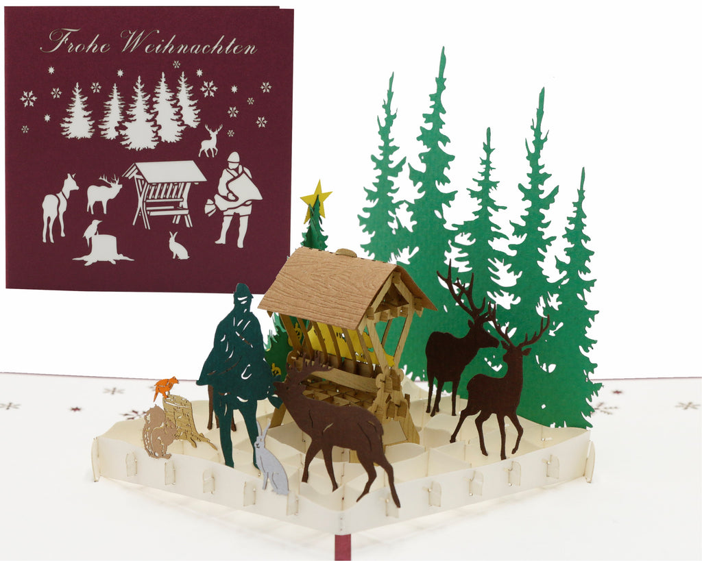 pop up karte futterkrippe im wald mit jäger und tieren