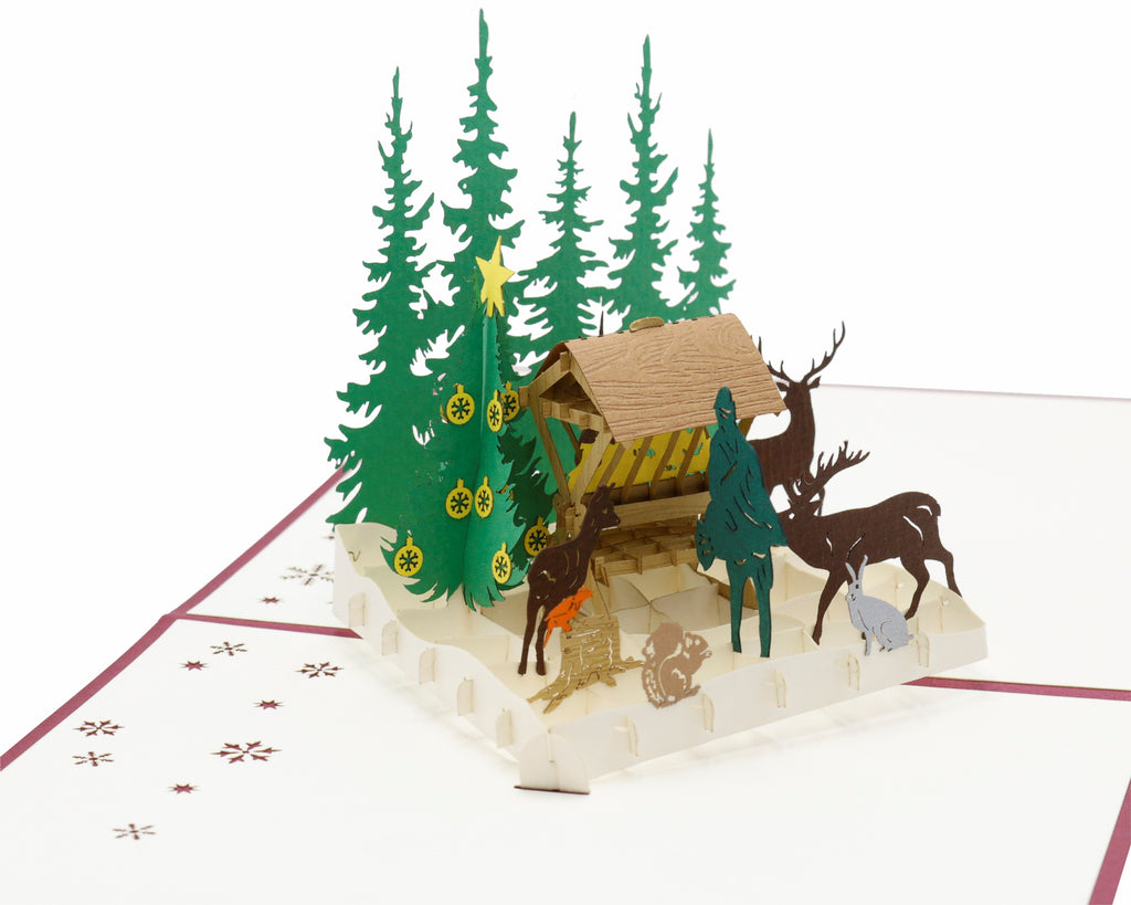 pop up karte futterkrippe im wald mit jäger und tieren