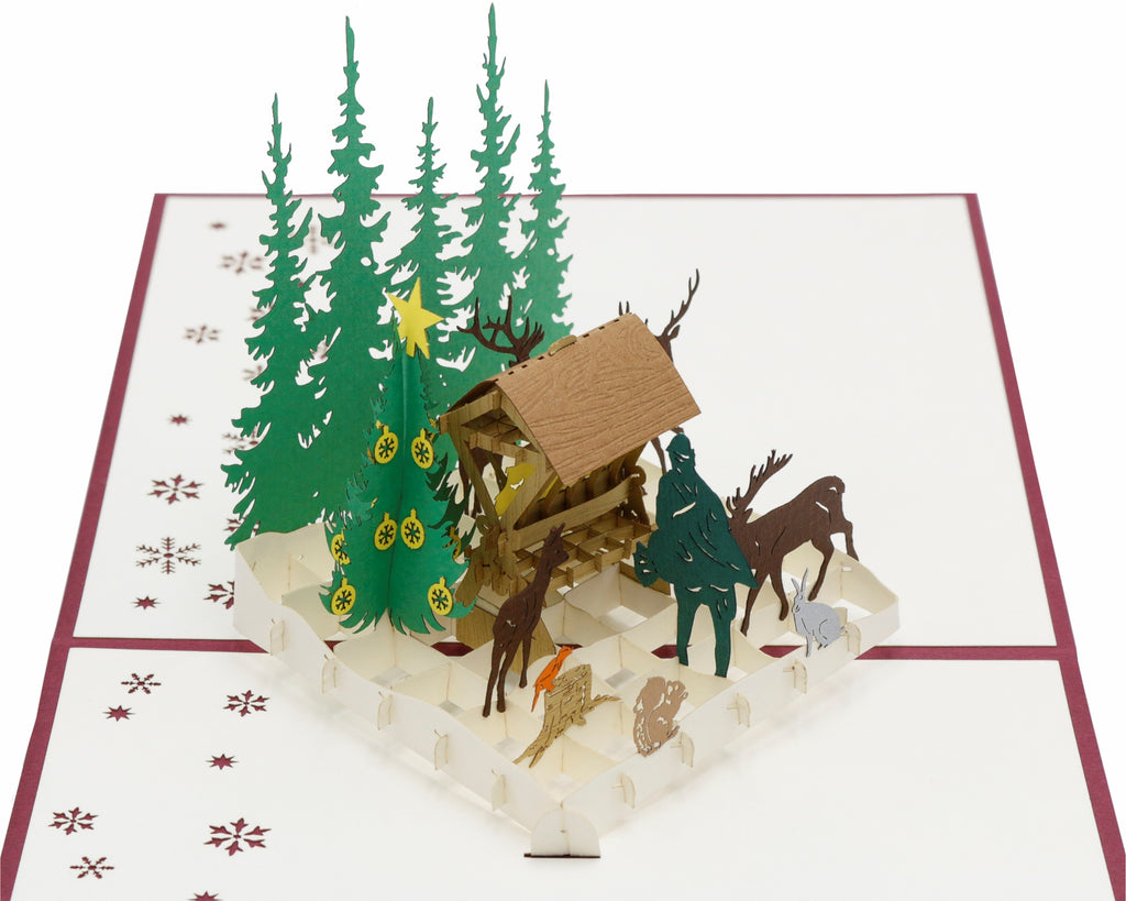 pop up karte futterkrippe im wald mit jäger und tieren