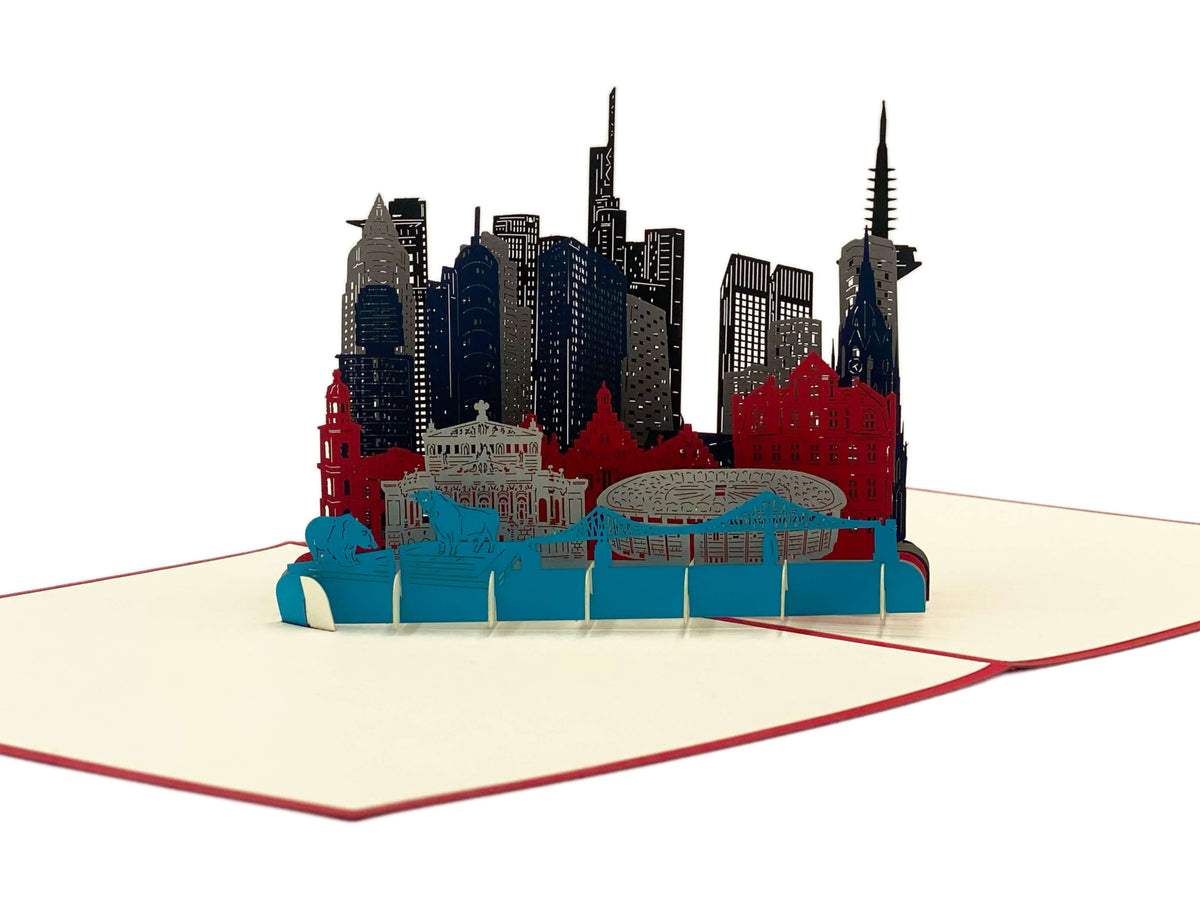 Aufgeklappte Pop-up-Karte mit der Frankfurter Skyline aus Hochhäusern, Römer und Mainbrücke.