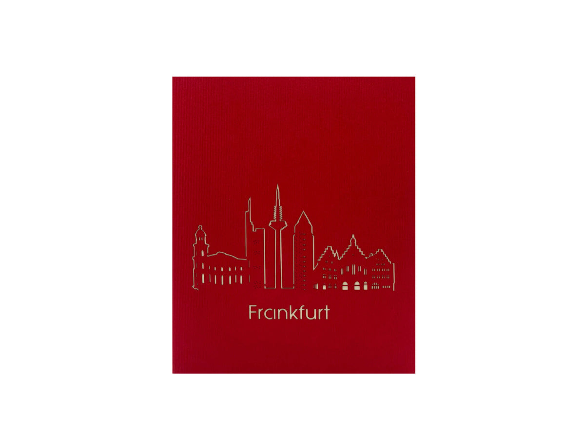 Rote Kartenvorderseite der Skyline Frankfurt Pop-up-Karte mit der Frankfurter Skyline in Gold und dem Schriftzug Frankfurt.