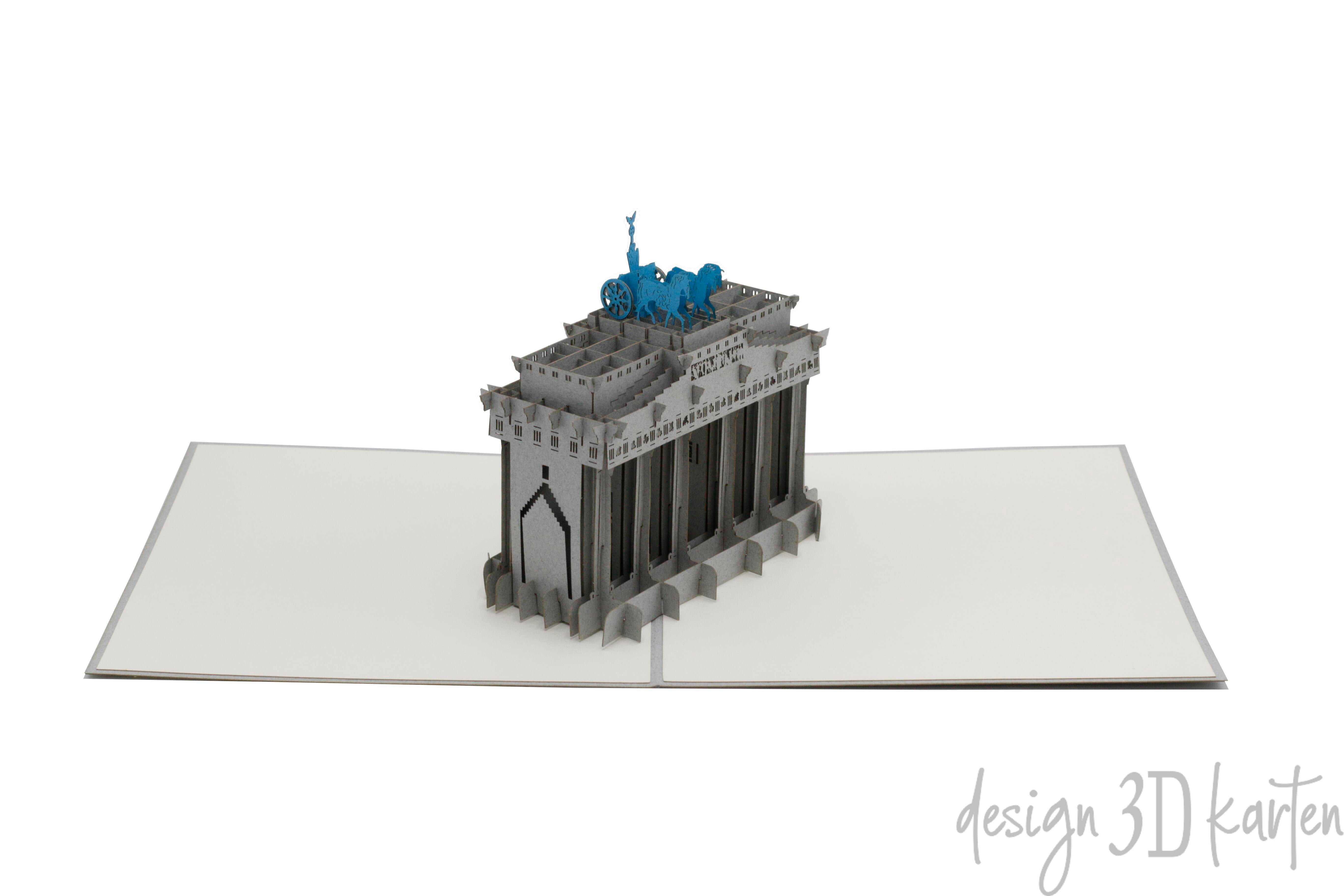 Aufgeklappte Pop-up-Karte mit dem Brandenburger Tor, frontal fotografiert.