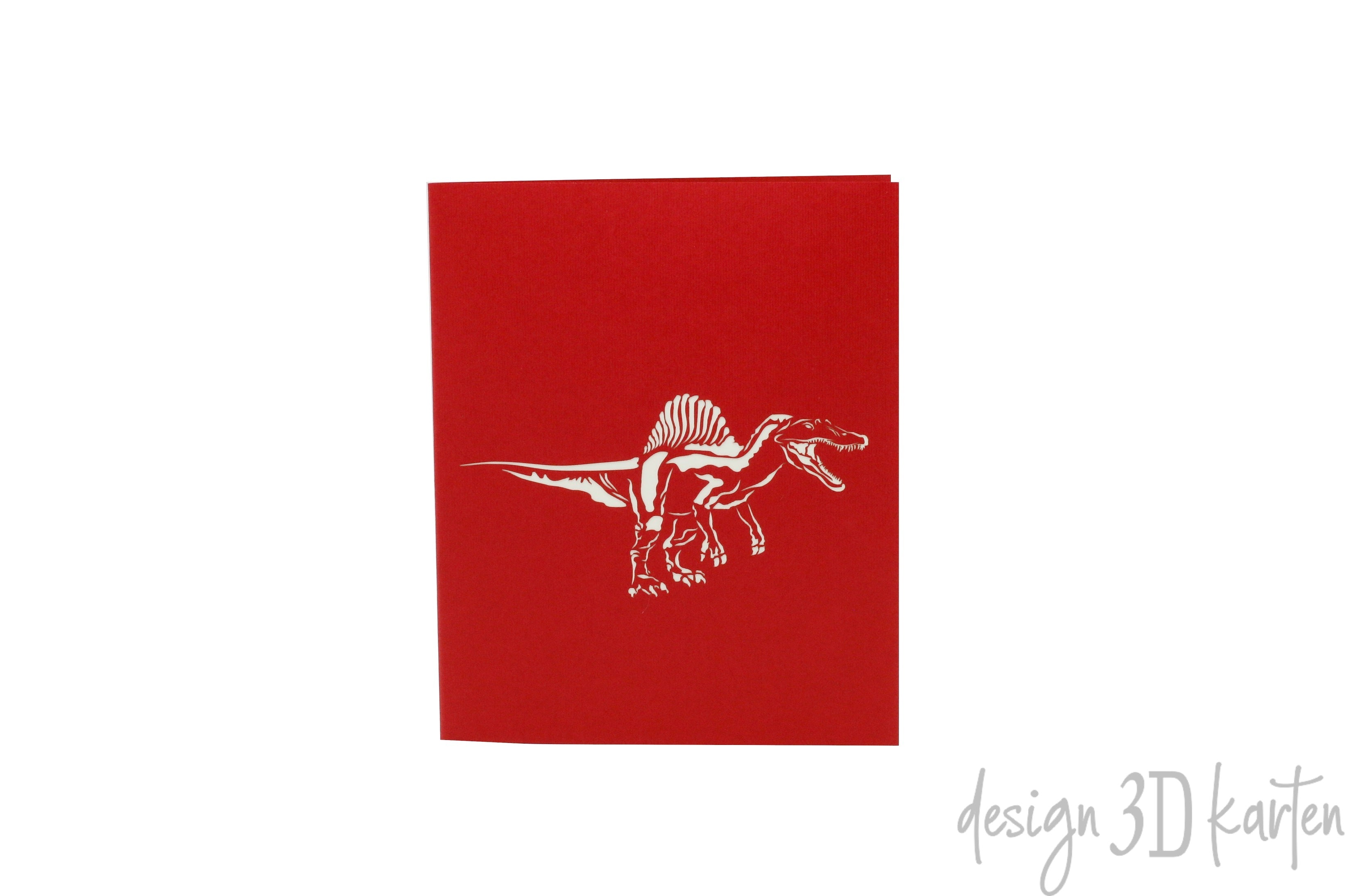 Rote Kartenvorderseite mit einem Dinosaurier als Scherenschnitt.