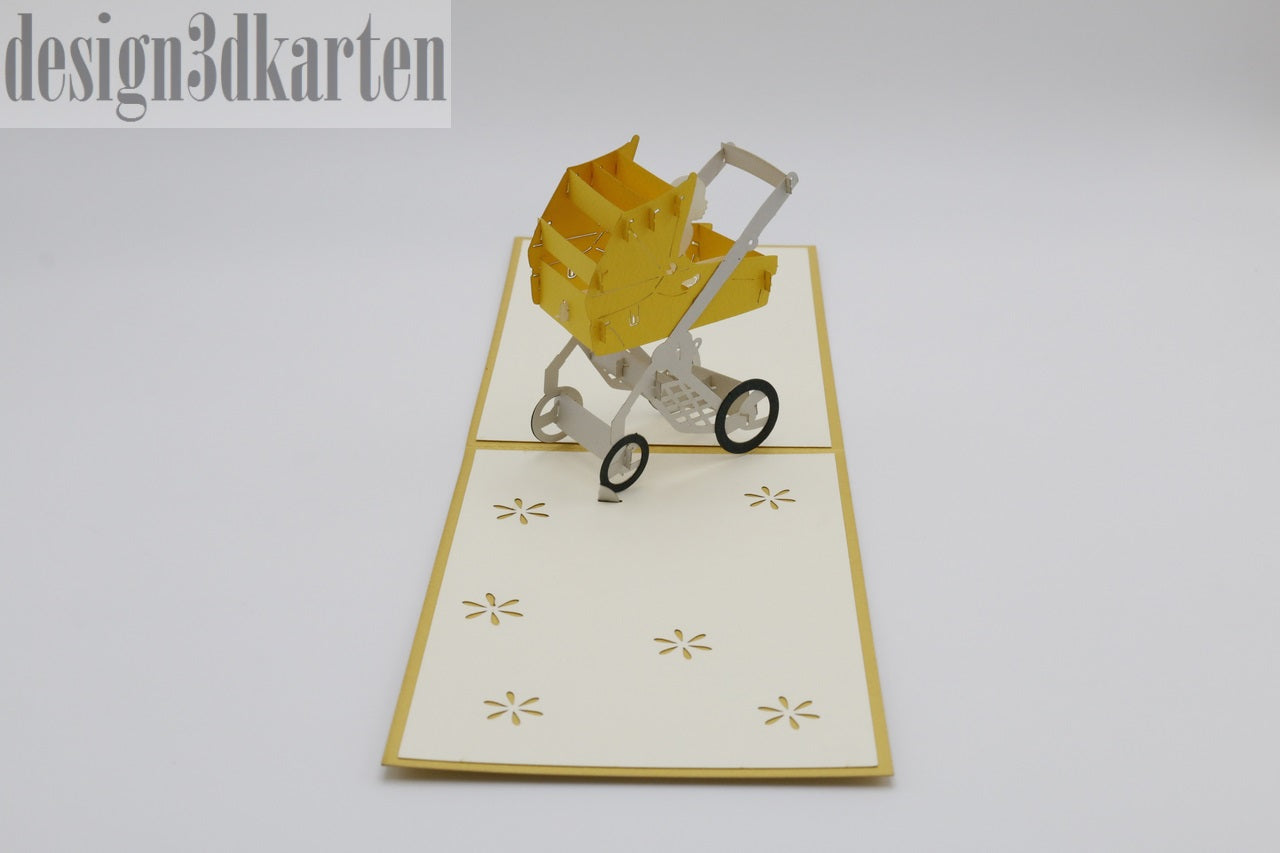 Aufgeklappte Pop-up-Karte mit gelbem Rand und einem gelben Kinderwagen aus Papier.