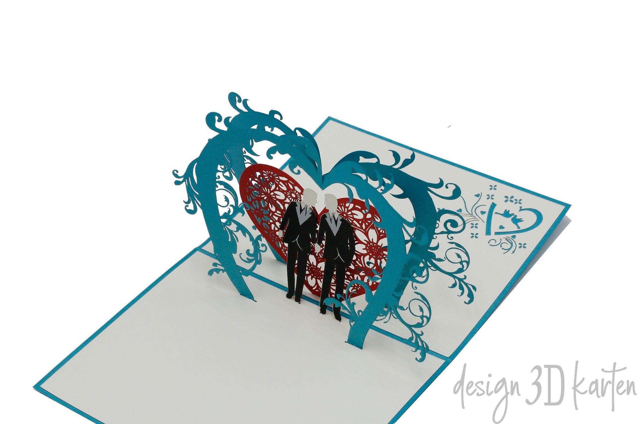 Aufgeklappte Pop-up-Karte mit gleichgeschlechtlichem Hochzeitspaar unter dem Blütenbogen, schräg von der Seite fotografiert.