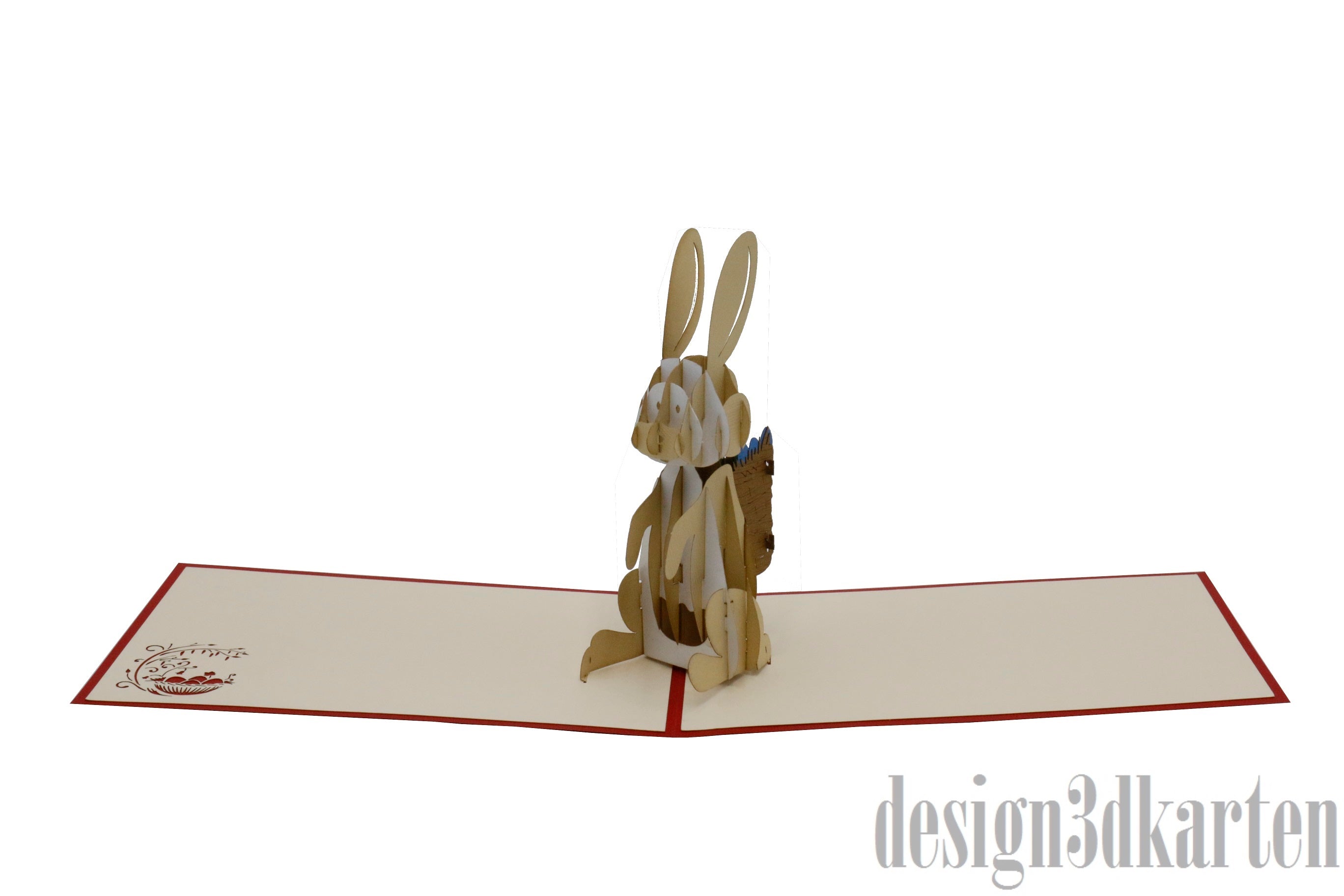 Aufgeklappte Pop-up-Karte mit Osterhase, flach von vorne fotografiert.