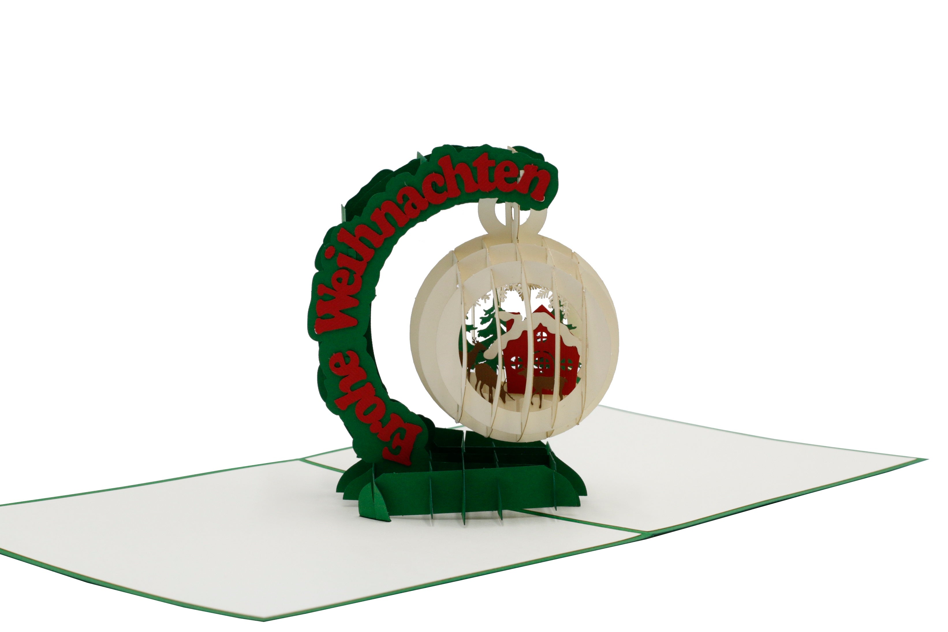 Nahaufnahme der aufgeklappten Pop-up-Karte mit Schneekugel, Winterlandschaft und dem Schriftzug Frohe Weihnachten.