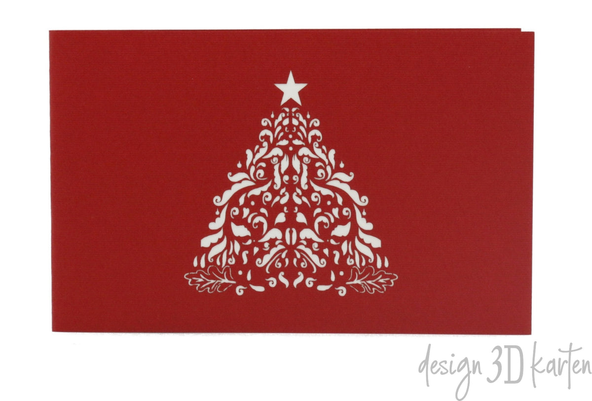 Rote Kartenvorderseite mit einem verzierten Weihnachtsbaum mit Stern als Scherenschnitt.