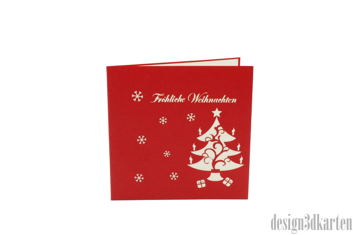 Rote Kartenvorderseite der Münster-Variante mit einem Weihnachtsbaum im Scherenschnitt und dem Schriftzug Fröhliche Weihnachten.